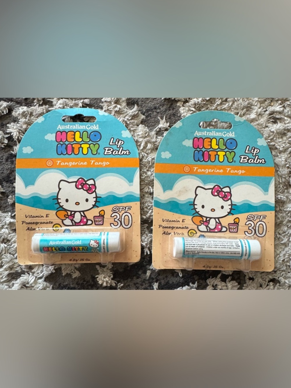 NEW (2) AUSTRALIAN GOLD Hello Kitty Tangerine Tango Lip Balm SPF 30 .15 Oz Each